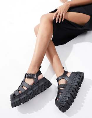 Buffalo - Ava Fisher - Flache Sandalen in Schwarz