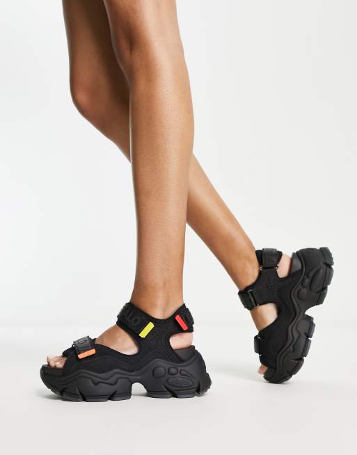 Buffalo Binary 0 vegan-friendly sporty sandals in black | ASOS