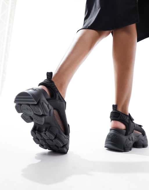 Buffalo Binary track flat sandals in black | ASOS