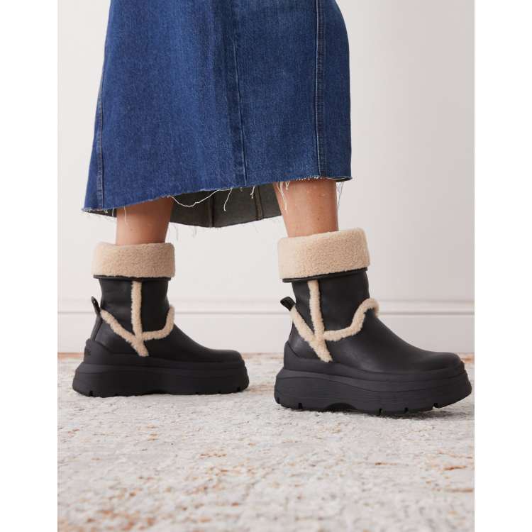 Buffalo foldover lined boots in black ASOS
