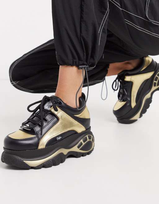 Buffalo - Sneakers chunky stringate nere e oro | ASOS