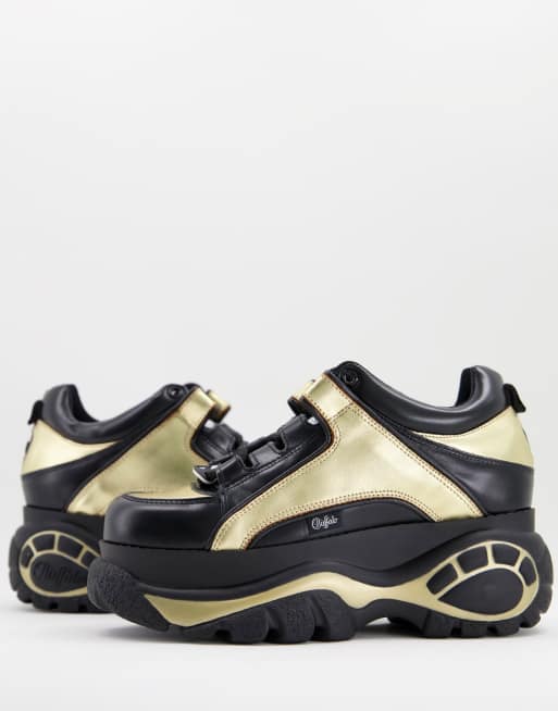 Buffalo - Sneakers met dikke plateauzool in zwart en goud