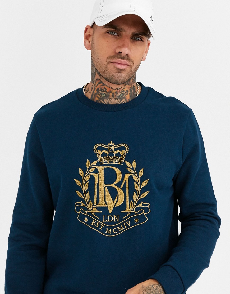 Burton Menswear – Blå sweatshirt med guldfärgat broderi