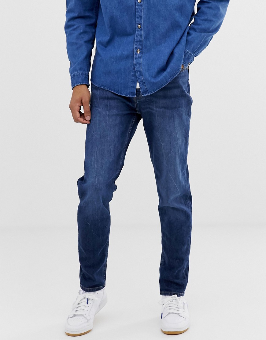 Burton Menswear carrot fit jeans in mid wash-Blue