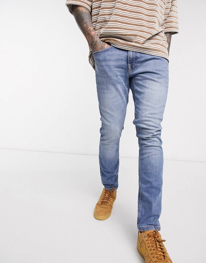 Burton Menswear - Jeans skinny in tessuto organico lavaggio blu medio