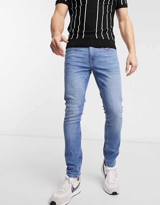 Burton Menswear skinny jeans in bright blue