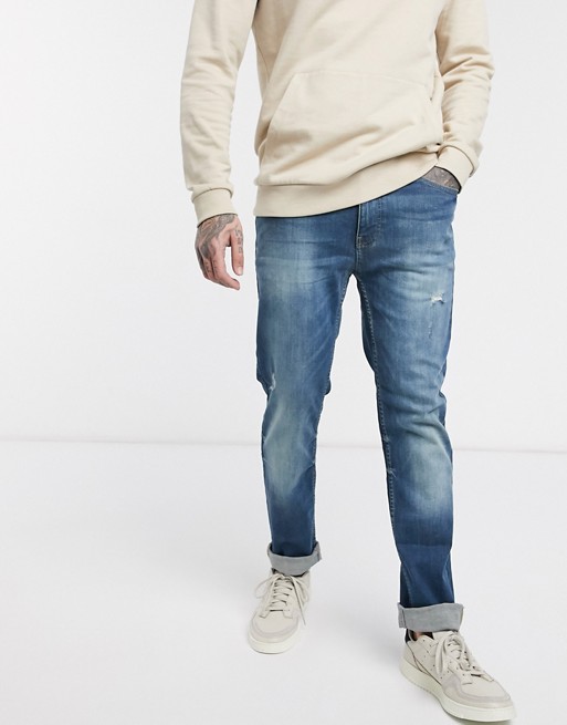Burton Menswear slim jeans in tinted greencast blue