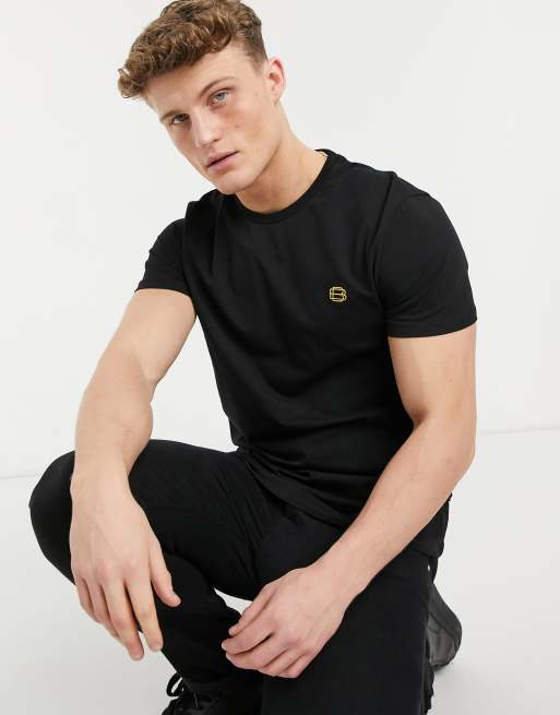 Burton Menswear – T-Shirt mit Logo in Goldfarben in Schwarz