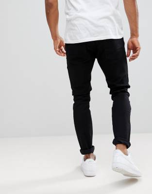 black tapered jeans