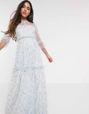 white maxi dress with blue embroidery