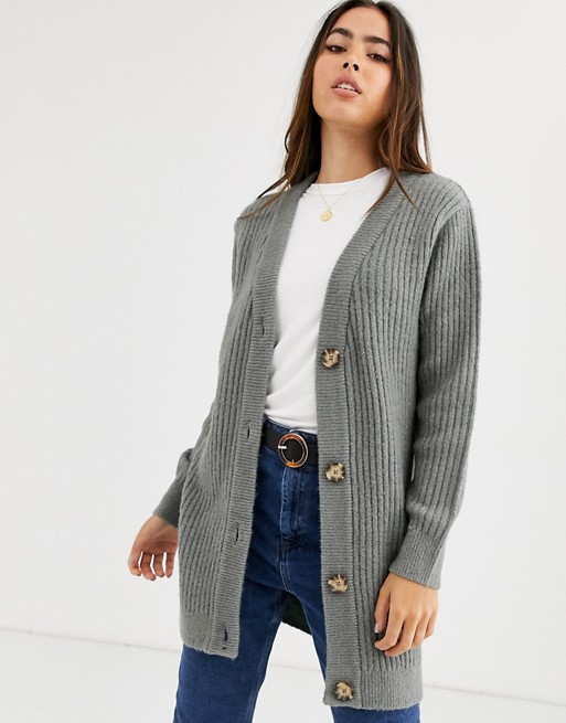 b.Young oversized knitted cardigan