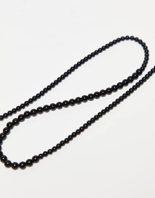 Cadena para gafas de cuentas negras con colgante de cruz de ASOS DESIGN, 4 de 4