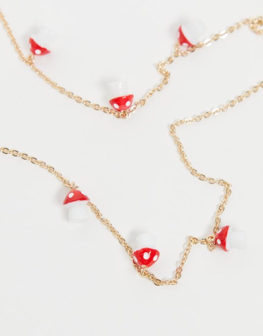 Cadena para gafas de sol dorada con charms de setas de ASOS DESIGN