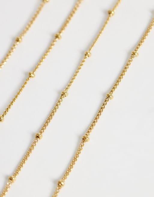 Cadena para gafas de sol dorada con cuentas esféricas de acero inoxidable resistente al agua de ASOS DESIGN, 2 de 3