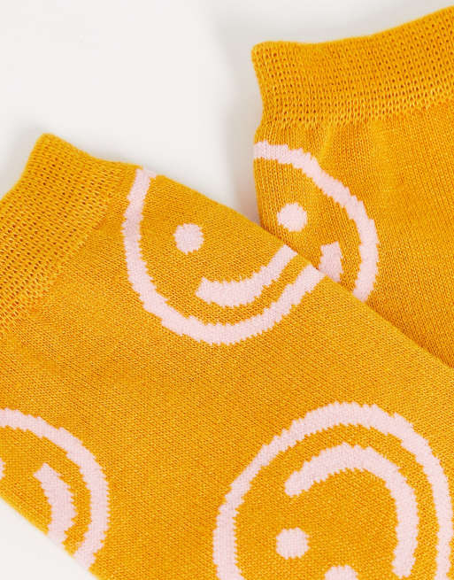 Calcetines amarillo caléndula estampado de caras felices de Baggu | ASOS