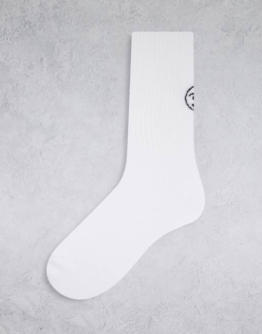 Calcetines deportivos blancos con bordado de cara guiñando un ojo de ASOS DESIGN
