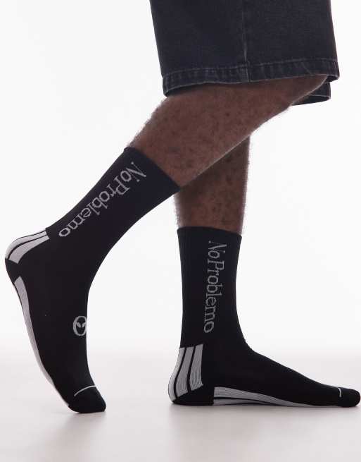 Calcetines negros a rayas con detalle de No Problemo