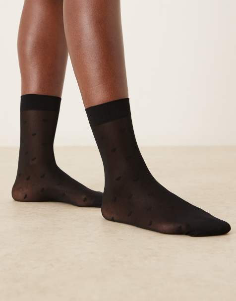 Calcetines negros traslúcidos con diseño de corazones de Accessorize - view 1