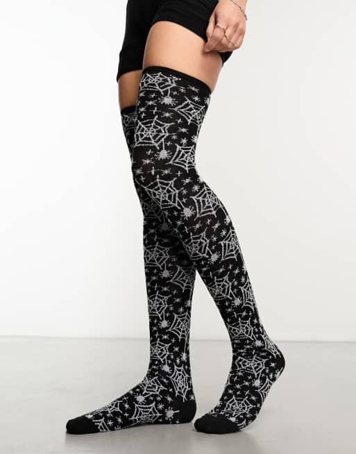 Calcetines por la rodilla negros con diseño de telaraña para Halloween de Threadbare