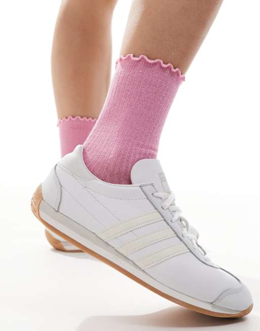 Calcetines rosas con acabado de purpurina y borde de volantes de canalé de Vero Moda