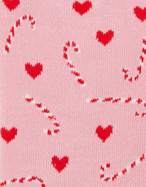 Calcetines rosas y rojos con diseño navideño de bastones de caramelos de Loungeable, 2 de 4