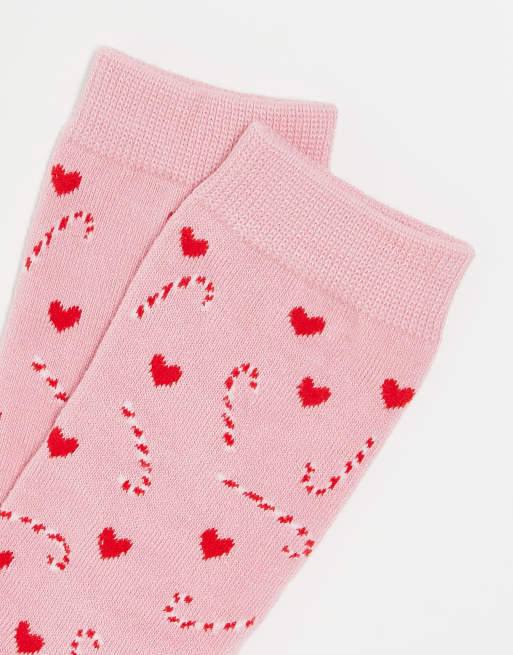 Calcetines rosas y rojos con diseño navideño de bastones de caramelos de Loungeable, 3 de 4