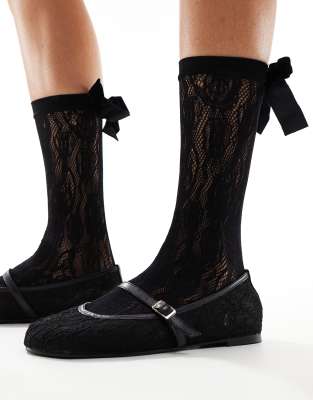 Calcetines tobilleros negros con lazo y diseño de flores de ASOS DESIGN
