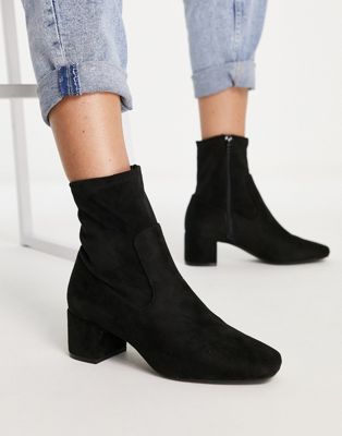 Call it Spring heeled sock boot in black