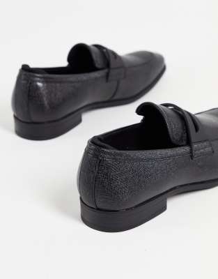 embossed loafers