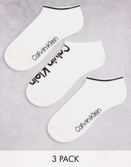 Calvin Klein 3 pack trainer socks in white with logo | ASOS