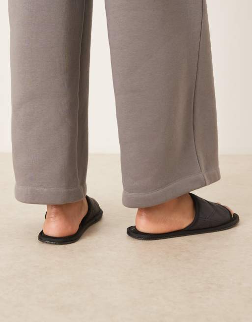 Calvin Klein all-over print slip-on slippers in black, 3 of 4