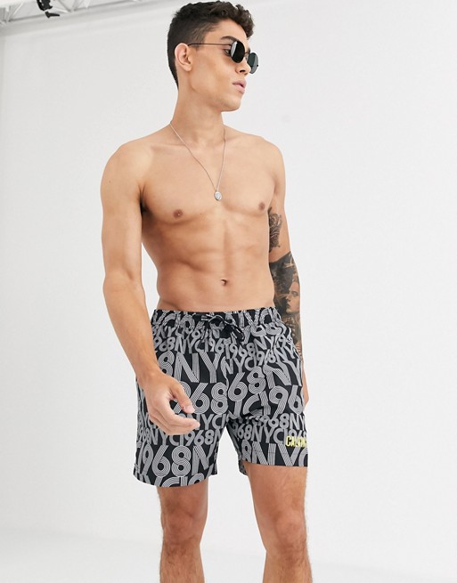 Calvin Klein all over print swim shorts in black