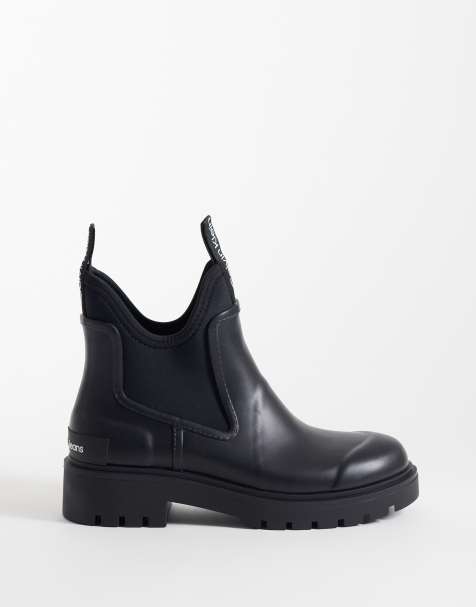 Calvin Klein ankle Chelsea gumboots in black - view 1