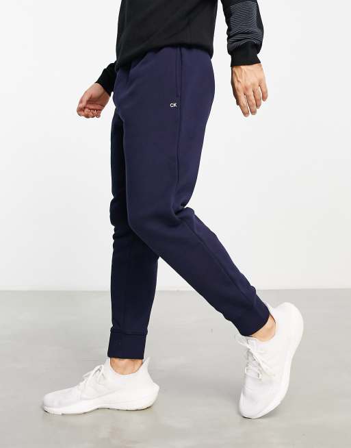 Calvin Klein AOP monogram joggers in navy exclusive to ASOS