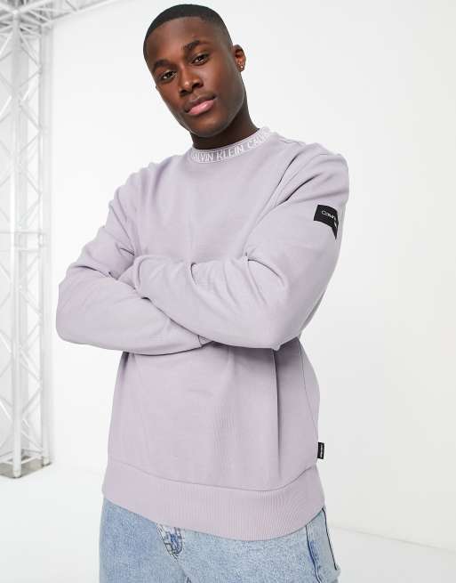 Calvin Klein ASOS Exclusive running neck logo sweatshirt in lilac