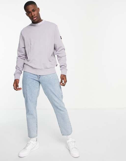 Calvin Klein ASOS Exclusive running neck logo sweatshirt in lilac