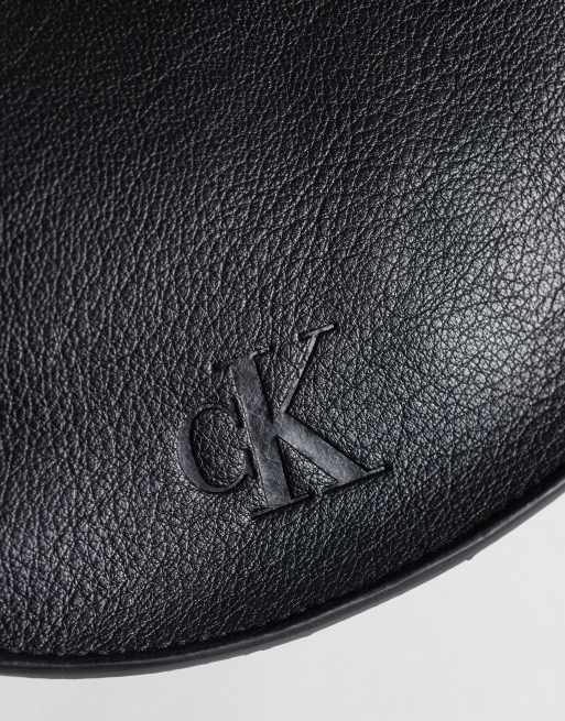 Calvin Klein asymmetrical buckle shoulder bag in black, 4 of 4
