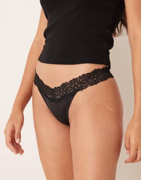 Calvin Klein Attraction lace detail thong in black