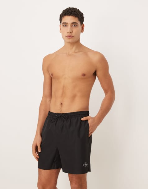 Calvin Klein – Badehose in Schwarz mit seitlichem Schriftzug - view 1