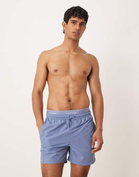 Calvin Klein – Badeshorts in Blau mit Logobund und Kordelzug - view 1
