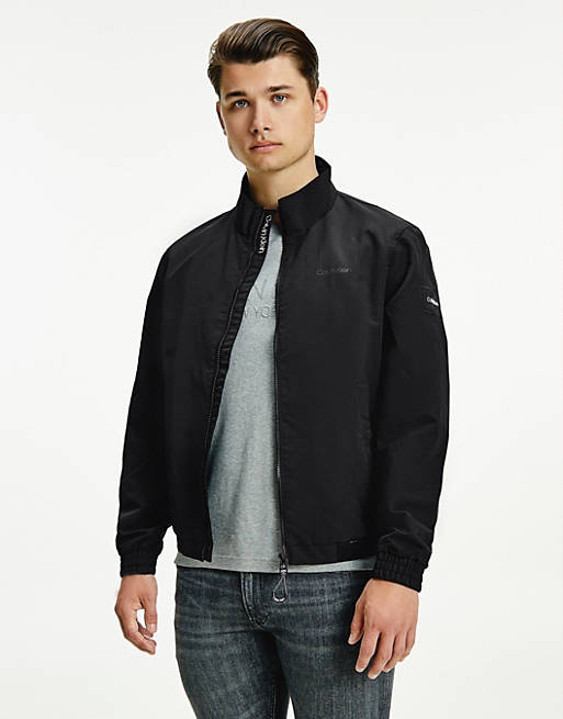 Calvin Klein badge logo nylon blouson jacket in black | ASOS