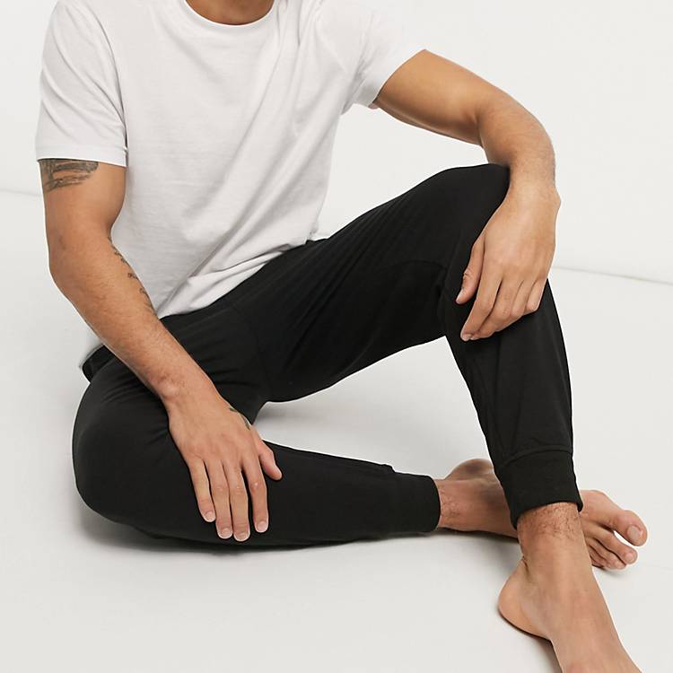 Calvin Klein barcode waistband jogger in black | ASOS