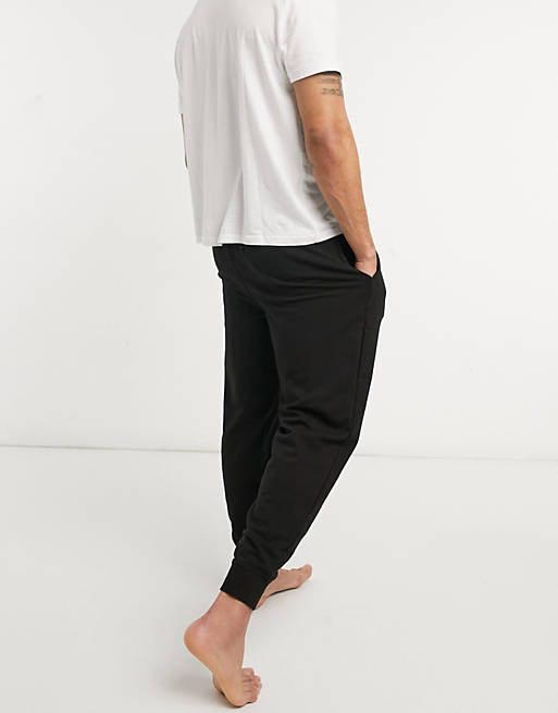 Calvin Klein barcode waistband jogger in black | ASOS