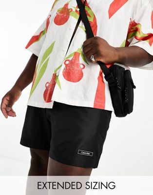 Calvin Klein Big & Tall core solids medium drawstring swim shorts in black - ASOS Price Checker