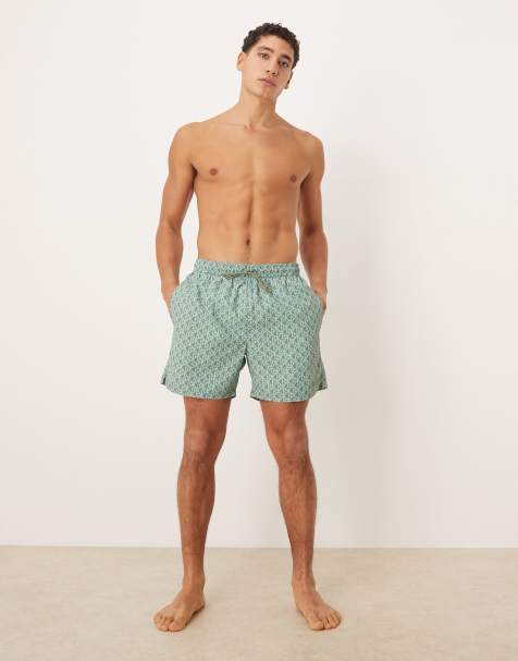 Calvin Klein – Blå och bruna, monogrammönstrade badshorts med dragsko - view 1