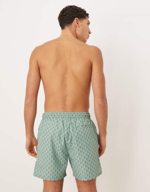 Calvin Klein - Blå og brune badeshorts med løbesnor og monogramprint , 3 af 5