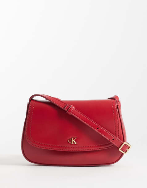 Calvin Klein - bolso cámara con correa y detalle dorado en rojo - view 1