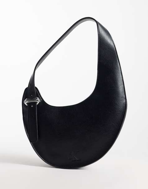 Calvin Klein - bolso de hombro asimétrico con hebilla en negro - view 1