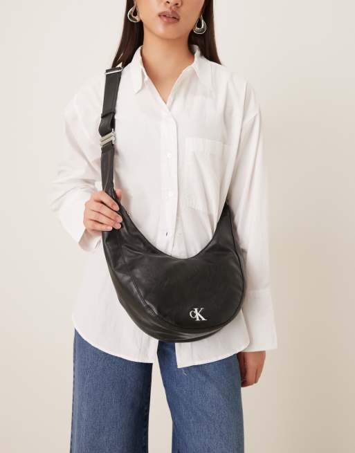 Calvin Klein - Borsa a mezzaluna nera lucida convertibile con fibbia , 4 di 4