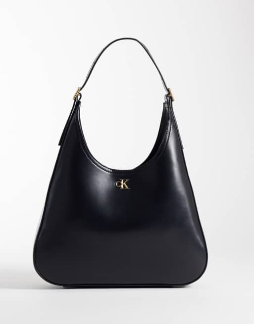 Calvin Klein borsa a secchiello grande e liscia con dettagli dorati nera